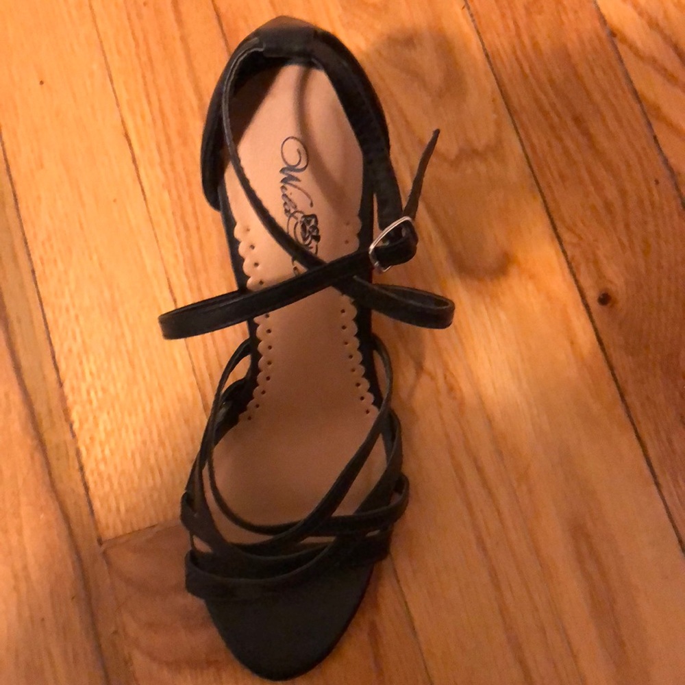 NWT Black Wedges with design heel size 7.5